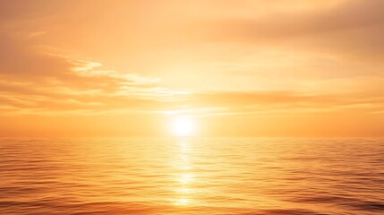 Obraz premium Golden Sunset over Calm Ocean.