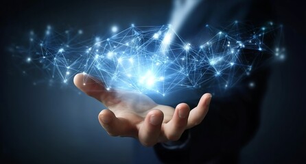 A businessman's hand holds a virtual, glowing network connection structure with blue light on a