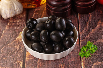 Mediterranean marinated Black olives in the bowl