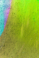 Beautiful colorful street art graffiti background for wallpaper and design.. Abstract bright painting pattern of urban art on a grunge wall.