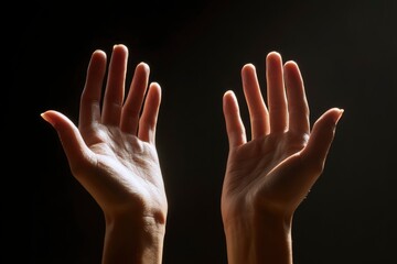 Hands Reaching Up in Dark Background
