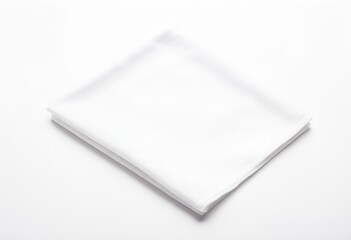 A folded white napkin on a white surface.