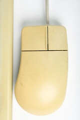 Vintage computer mouse from the 1990s, on a white background.