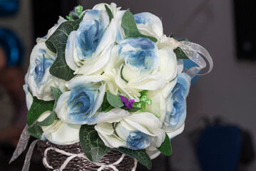 wedding bouquet of roses and rings