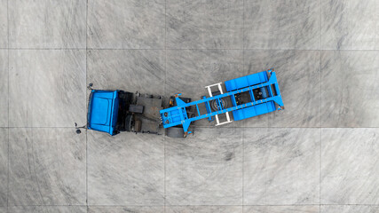 Aerial view semi truck cargo trailer at logistic park warehouse goods, Distribution warehouse shipping supply chain, Business transportation logistic freight shipping cargo by semi truck cargo trailer