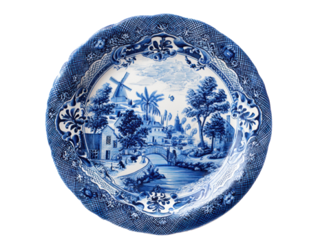 Blue decorative plate featuring countryside landscape design