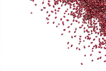 Scattered red beans on white background