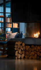Fototapeta premium Captivating fireplace scene with stacked firewood creating a warm and inviting atmosphere at home