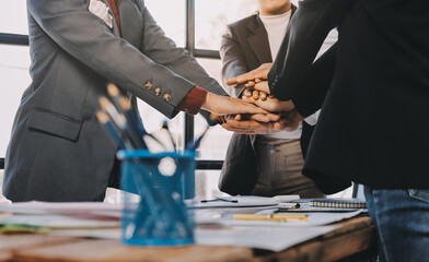 Obraz premium Business handshake for teamwork of business merger and acquisition,successful negotiate,hand shake,two businessman shake hand with partner to celebration partnership and business deal concept.