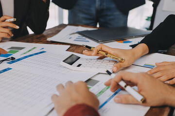 Business financing accounting banking concept. Business woman hand doing finances and calculate on desk about cost at home office. Woman working on desk with using calculator, finance accounting.