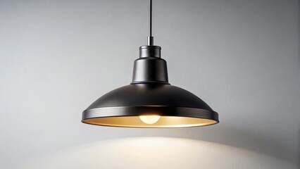 A Modern Dark-Colored Pendant Light Fixture Illuminates a Neutral-Toned Wall, Casting a Soft Glow