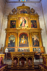 Interiors of Seville gothic cathedral in Andalusia, Spain