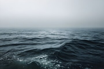 Vast moody ocean under an overcast sky