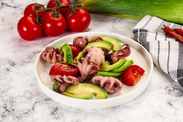 Salad with baby octopus and avocado