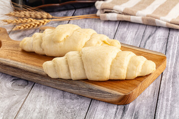 Raw uncooked croissant for bake