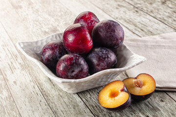 Ripe sweet juicy plum heap