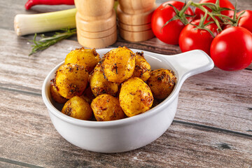 Baked small baby potato with herbs