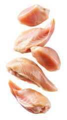 Raw chicken breasts in mid air against a black background showcase freshness