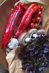 FRESH VEGETABLES , SWEET RED PEPPERS, MUSHROOMS, GARLIC BULB, PURPLE LETTUCE, CHERRY TOMATOES
