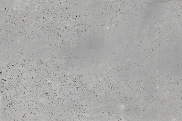 Obraz premium A close up shot of a gray terrazzo surface with small and large pieces of aggregate visible throughout it 