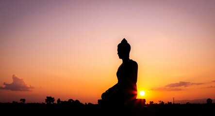 Vesak Day Buddha Silhouette with a sunset at the mountains | Greetings Card | Concept of important days in Buddhism | Vesak day celebration.	
