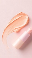 Peach-Colored Eye Cream Swirl on Pink Background