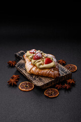 Food for breakfast sweet strawberry croissants with chocolate filling