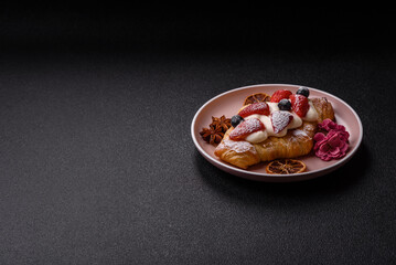 Food for breakfast sweet strawberry croissants with chocolate filling