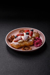 Food for breakfast sweet strawberry croissants with chocolate filling