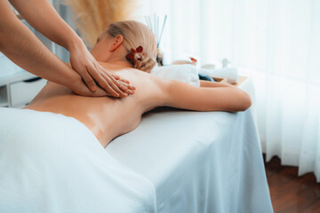 Caucasian woman customer enjoying relaxing anti-stress spa massage and pampering with beauty skin...