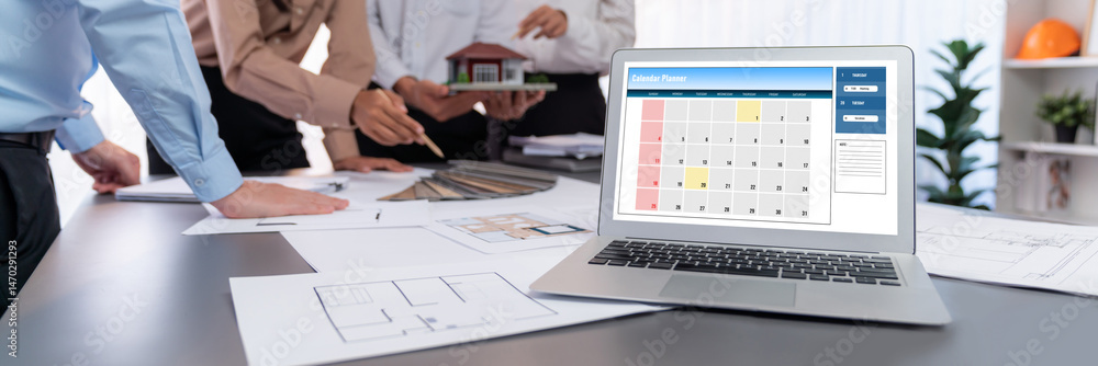 Poster calendar on computer software application for brisk schedule planning for personal organizer and onl