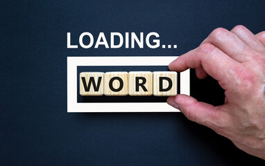 Word symbol. Concept word Loading Word on beautiful wooden blocks. Businessman hand. Beautiful...