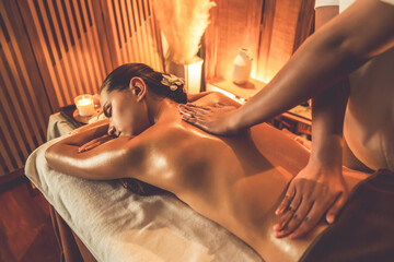 Caucasian woman customer enjoying relaxing anti-stress spa massage and pampering with beauty skin...