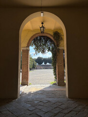 Arches of the Fortezza Medicea public park, an old medieval fortress in Siena, Italy.