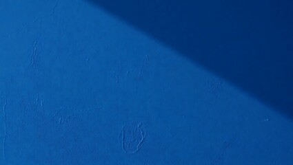 Dark blue textured plaster wall background