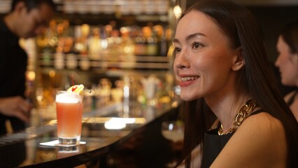 Friends or couple talking in focusing Paloma cocktail at luxurious counter bar, celebrating special party beverage in Margarita and Old fashioned at vibrant nightclub lifestyle Friday night. Vinosity.
