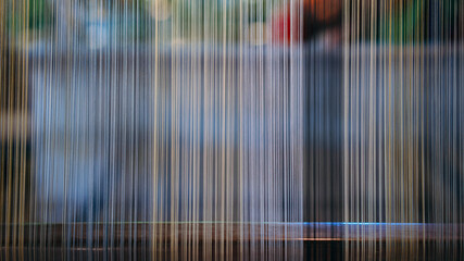 Silk thread from weaving machine traditional craft, a vibrant tapestry of color.