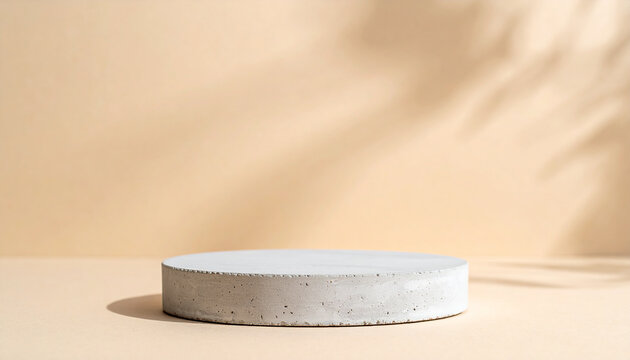 Concrete podium for product presentation with beige wall. Empty surface of showcase platform.