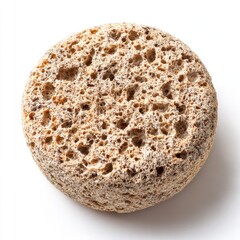 Close up shot of a porous pumice stone circle shape object on white background