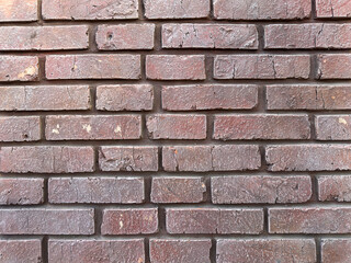 Brick Wall Texture Showcasing Warm Tones and Rustic Charm in a Close-Up View