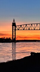 Cape Cod canal railroad bridge (vertical lift) - beautiful orange sunset view 