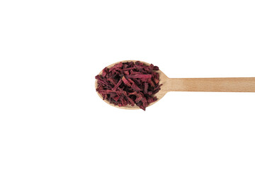 Dried beetroot slices on wooden spoon isolated on white background.