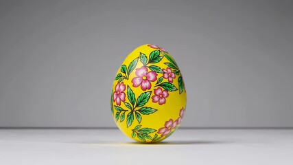 Vibrant rotating easter egg with floral patterns on varied backgrounds - Powered by Adobe