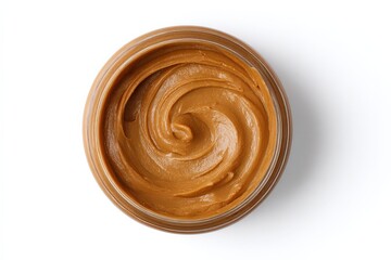 Creamy peanut butter in a jar, overhead shot.