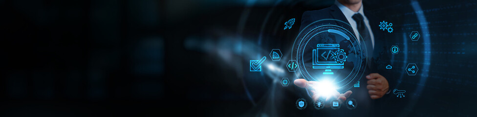Software Development, businessman holding application development icons, business and integrated...