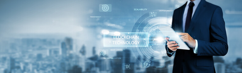 Blockchain technology, businessman using tablet analyzing distributed ledger data and decentralized network, secure transaction systems, smart contract automation, transparent financial solutions