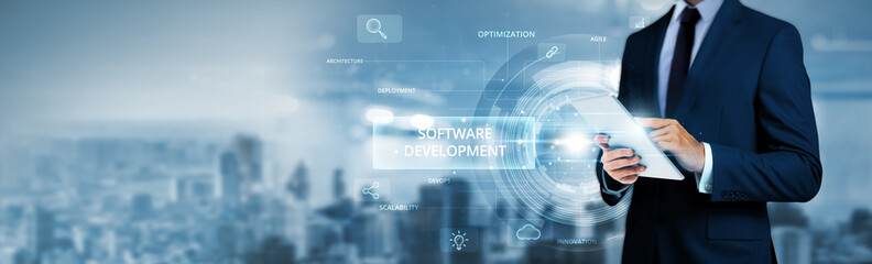 Software Development, businessman using tablet analyzing application performance data and...