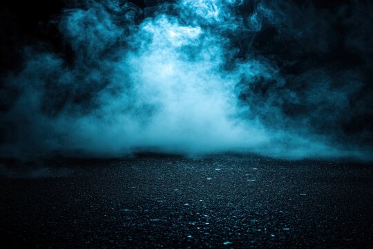 Dark, smoky scene with blue mist on a paved surface