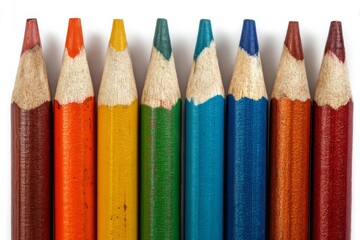 Fototapeta premium A visually appealing, close-up shot of a colorful set of sharpened pencils in a row.