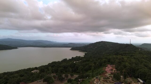 Afternoon View of a Calm Reservoir bili bili dam Lake with Soft Natural Light in sulawesi